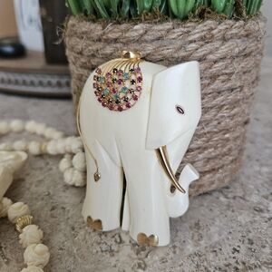 Elegant Ivory Elephant Charm with Gold Accents and Gems